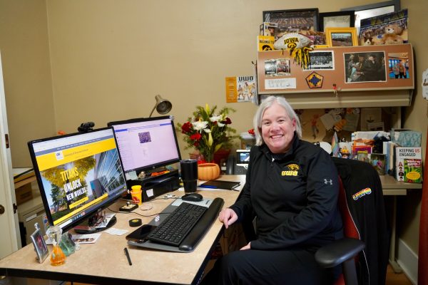 Haylea Van De Yacht / Advance-Titan - Debbie Gray Patton has worked at UWO for 27 years in USP, the Dean of Students office and as a hall director. Her love of UWO is evident through spiritwear, posters and photos at her desk. 