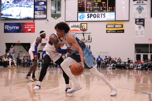 Katie Pulvermacher / Advance-Titan -- The Herd's Stephen Thompson dribbles past a defender at the Oshkosh Arena in a game during the 2023-24 season.