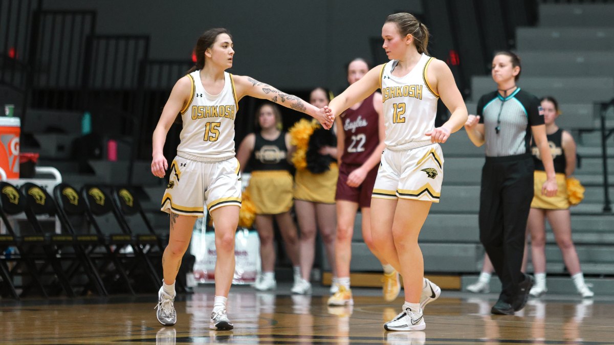 Courtesy of UWO Athletics
Cut: Bridget Froehlke (right) congratulates Kennedy Osterman after a play against UW-La Crosse. The two combined for 33 points in the game.