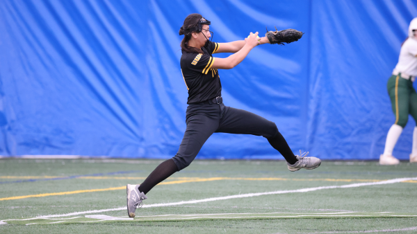 Courtesy of UWO Athletics 
Brianna Bougie winds up for a pitch during her no-hitter against St. Norbert on April 4. 
