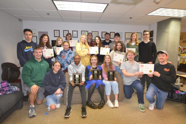 Advance-Titan 
The Advance-Titan staff poses with their WNA awards. The A-T claimed 14 awards at the Better Newspaper
Contest March 15.