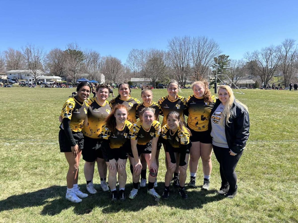 Jade Springer /Advance-Titan
Part of the UW Oshkosh’s Women’s Rugby team smile for a post-game photo