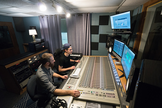 Music industry students work in a recording studio located in the Arts & Communications building.