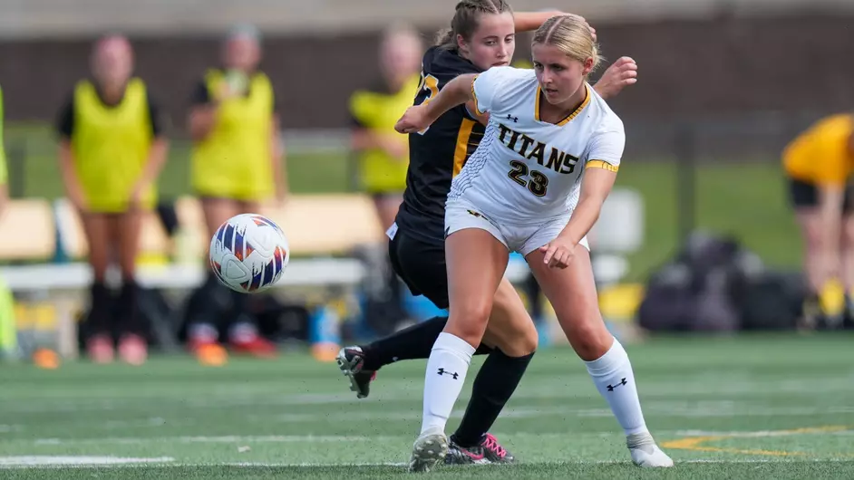 Courtesy of Terri Cole / UWO Athletics -- UWO's Gabby Born dribbles away from an opponent in a game earlier this season at Titan Stadium.