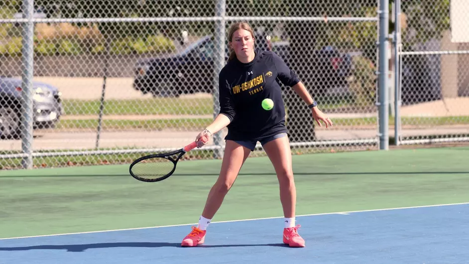 Courtesy of Steve Frommell / UWO Athletics -- Oshkosh's Brianna Owens won the fourth singles flight and partnered with Courtney Carpenter in a No. 2 singles win.