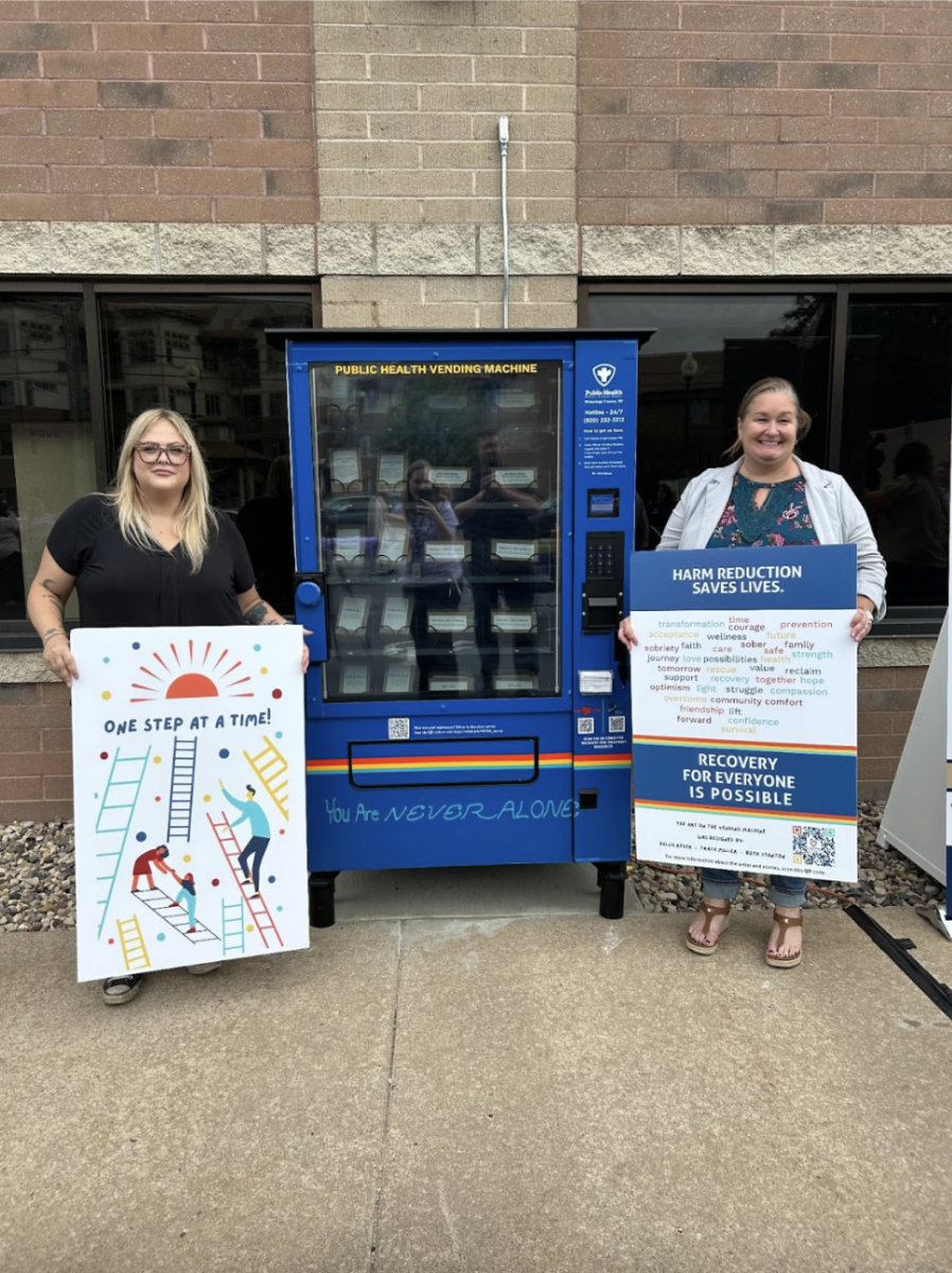 Kelly Reyer, left, and Tracy Miller, right, are two of the three design contest winners that have their artwork featured on the WCPH’s vending machines.