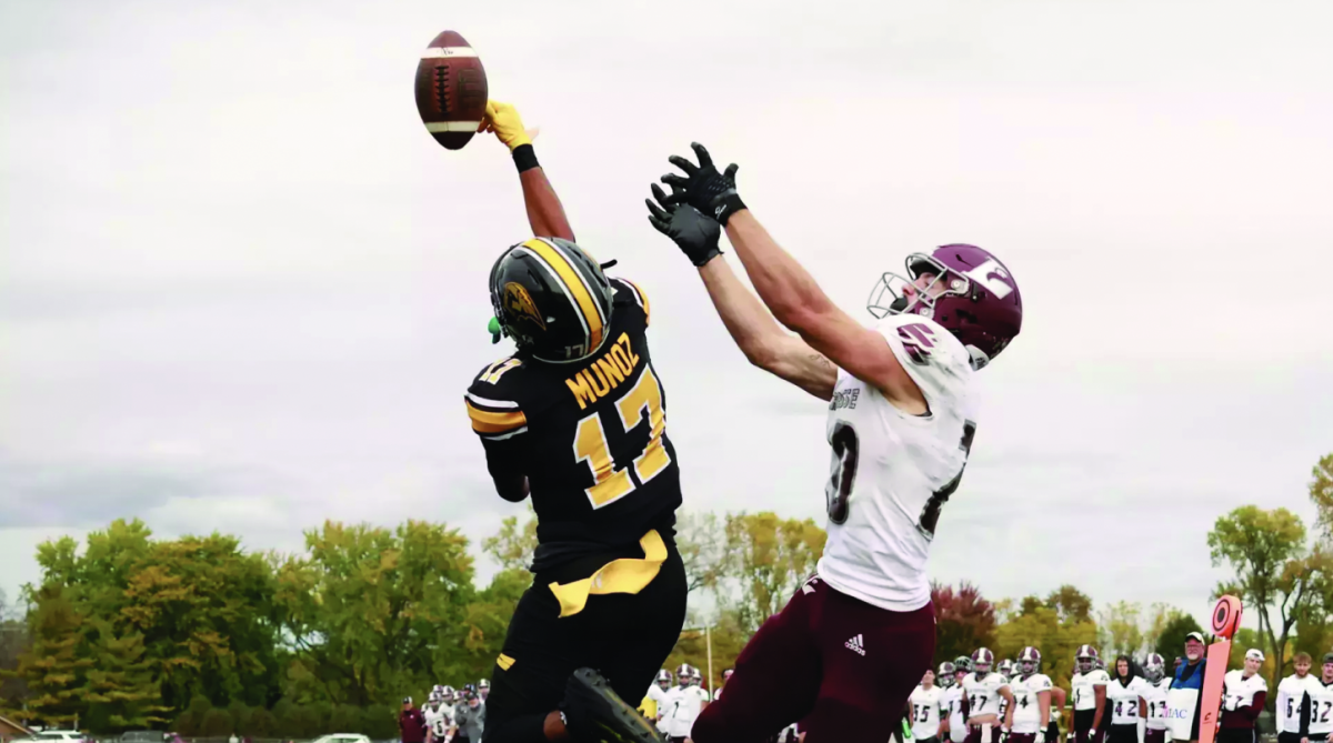 UWO’s Jose Munoz-Dominguez deflects an Eagle pass during the second quarter of the game on Oct. 12 at J.J. Keller Field at Titan Stadium.