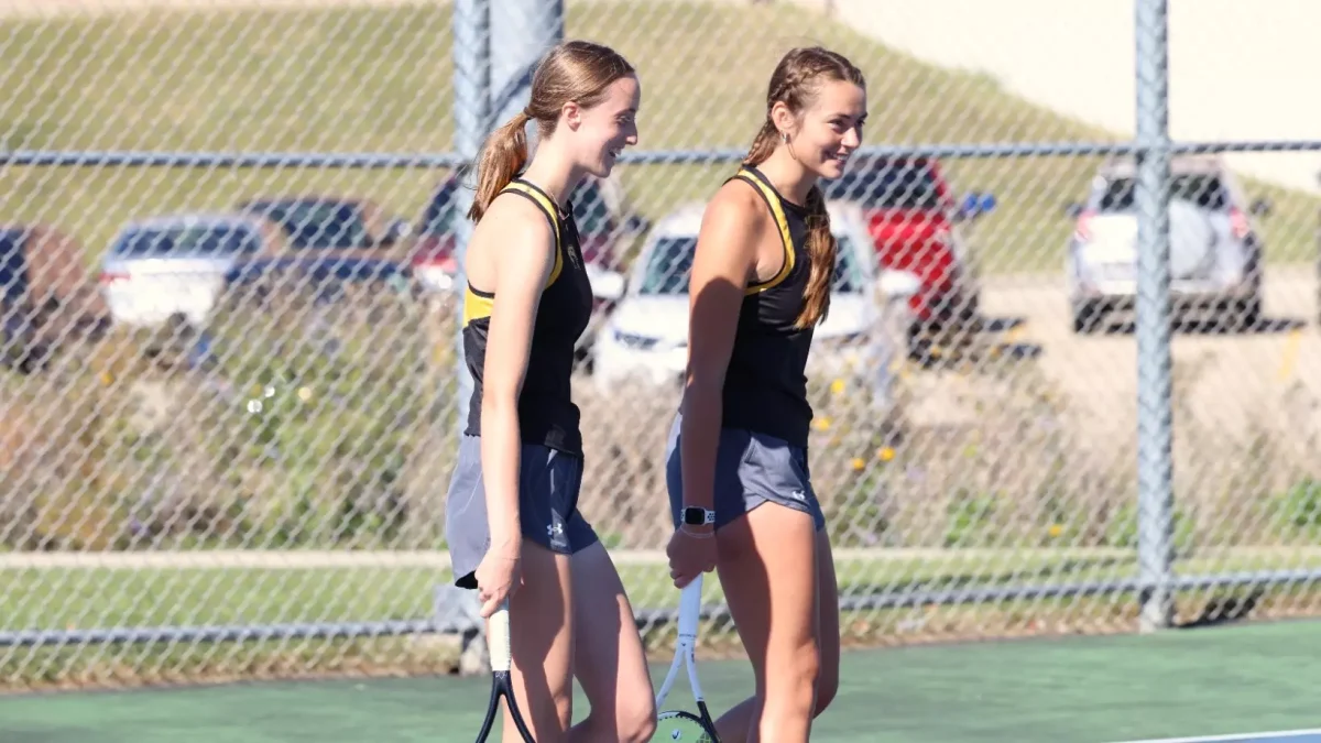 UWO doubles partners Olivia Pethan and Alysa Pattee celebrate after the Titans’ match win.