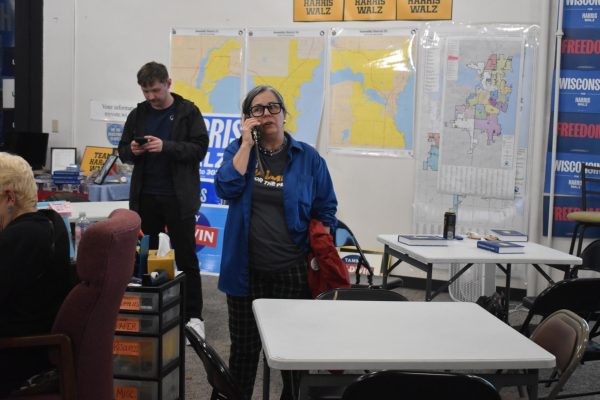 Lori Palmeri makes a phone call at the Winnebago County Democratic Party building in Oshkosh Nov. 5.