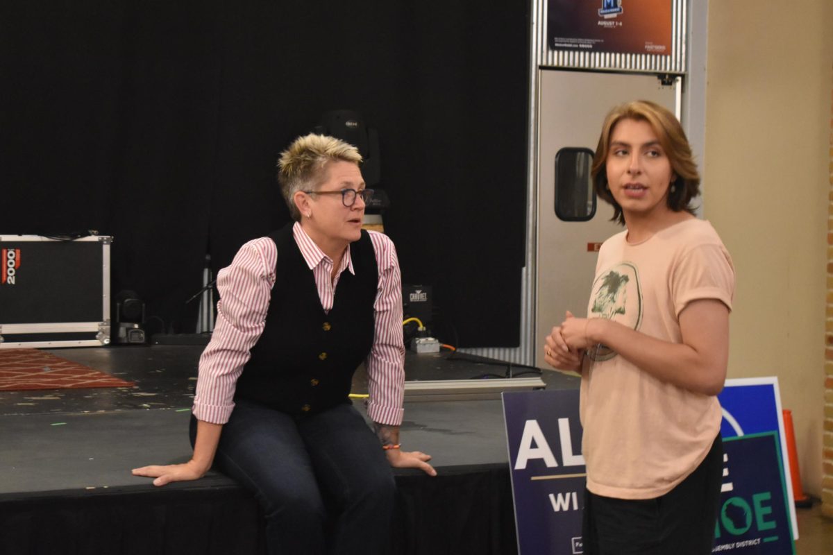 Alfheim, left, sits and talks to a constituent during her election watch party Nov. 5 in Appleton. Alfheim won her race for State Senate seat for District 18, which includes Neenah, Menasha and parts of Appleton and Oshkosh.
