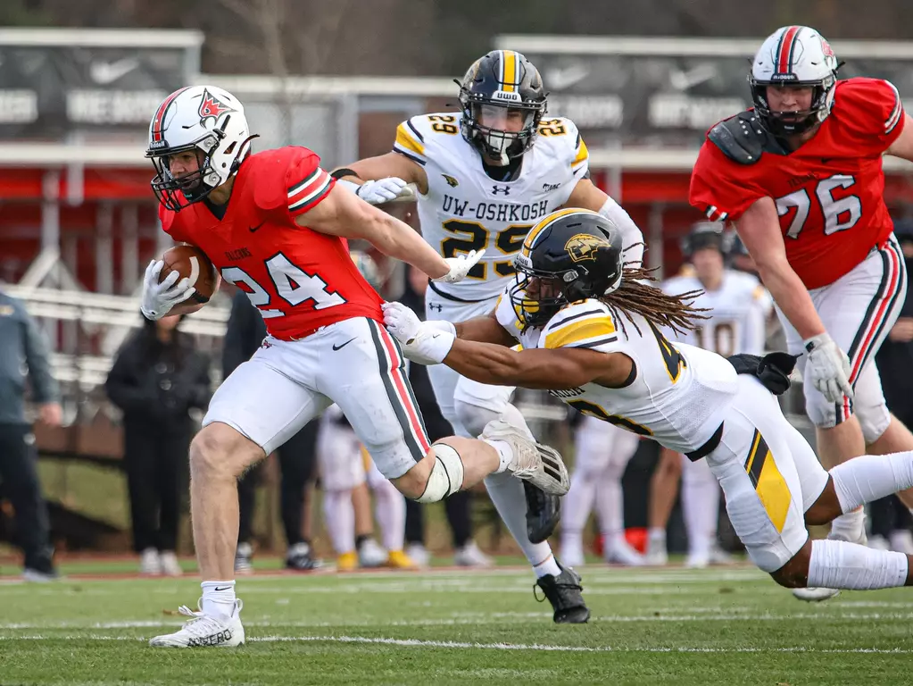 UWO’s Caleb Noennig (29) and Caleb Smith (43) try to tackle a 
UWRF player during the game on Nov. 16