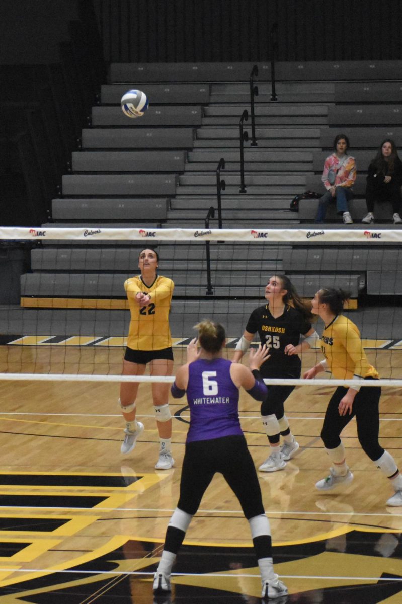 Isaac Pischer / Advance-Titan -- Izzy Coon (22) sets up for a dig against UW-Whitewater in the WIAC Championship game Nov. 16 at the Kolf Sports Center.