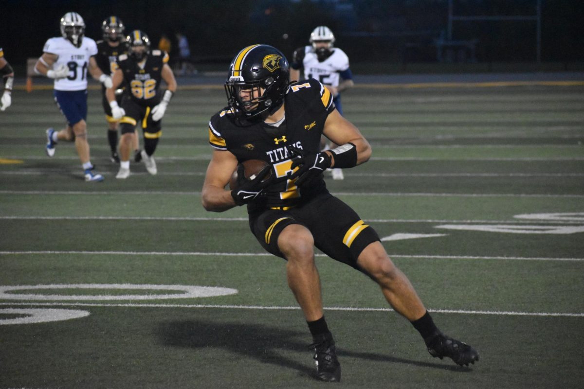 UWO's Clayton Schwalbe looks for more yardage after completing a catch during the game versus UW-Stout at Titan Stadium on Nov. 9. 