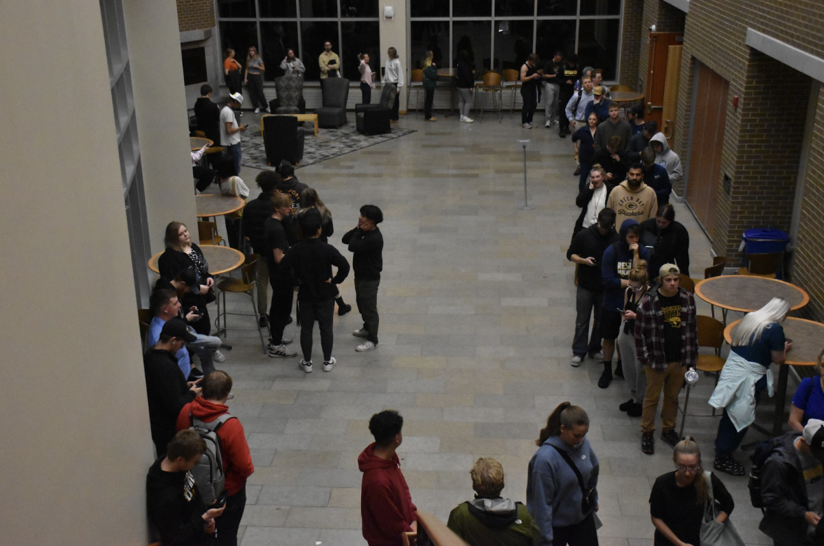 UWO students wait in line to vote.