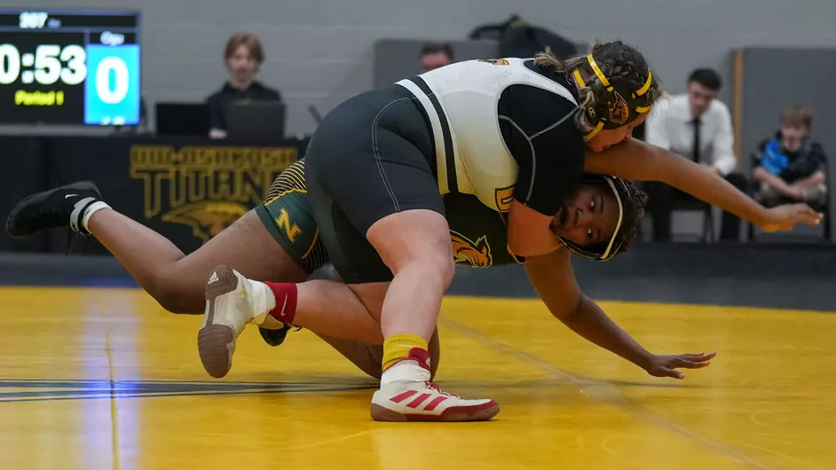 Courtesy of Terri Cole / UWO Athletics -- Oshkosh's Alivia Davey looks to pin an opponent earlier this season at the Kolf Sports Center.