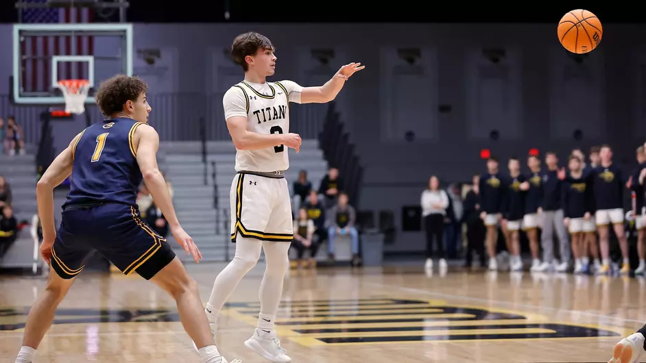 Courtesy of Doug Sasse / d3hoopsphotography.com -- UWO's Joey LaChapell passes the ball in a game earlier this season at the Kolf Sports Center.