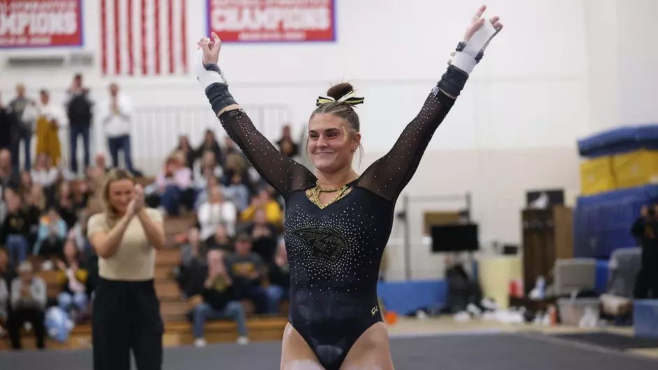 Courtesy of Steve Frommell / UWO Athletics -- Amaya McConkay celebrates after winning the uneven bars with a score of 9.750 points.