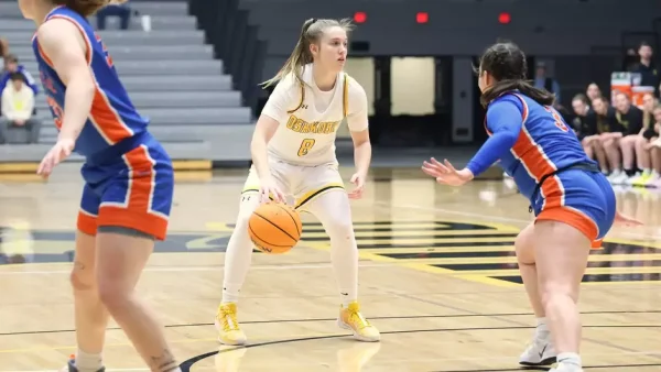 Courtesy of Steve Frommell / UWO Athletics -- Oshkosh's Sammi Beyer dribbles the basketball in a game earlier this season at the Kolf Sports Center.