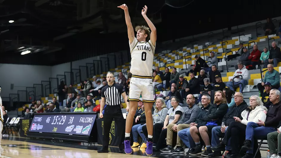 Courtesy of Steve Frommell / UWO Athletics -- Oshkosh's Brandon Beck launches a 3-pointer in a game earlier this season at the Kolf Sports Center.