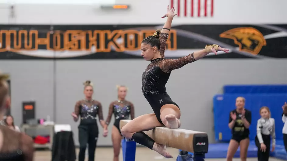 Courtesy of Terri Cole / UWO Athletics -- Delaney Cienkus performs on the balance beam in a meet earlier this season at the Kolf Sports Center.