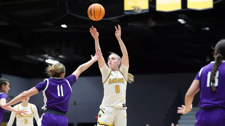 Courtesy of Steve Frommell / UWO Athletics -- Oshkosh's Sammi Beyer puts up a jumper against UW-Whitewater in UWO's 77-69 double-overtime victory Wednesday night at the Kolf Sports Center.