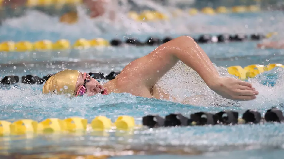 Courtesy of Steve Frommell / UWO Athletics -- Law Lykins swims for UWO in a meet earlier this season.