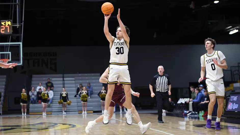 Courtesy of Steve Frommell / UWO Athletics -- UWO's Matt Imig shoots a 3-pointer against UW-La Crosse at the Kolf Sports Center Saturday.