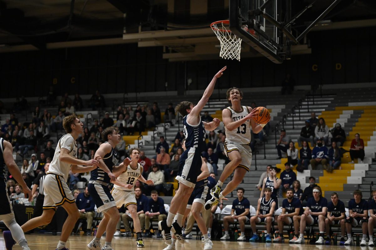 Jess Duch / Advance-Titan -- UWO's Logan Rindfleisch puts up a layup against UW-Stout at the Kolf Sports Center Feb. 22.