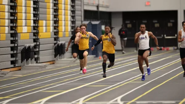 Courtesy of Steve Frommell / UWO Athletics -- Oshkosh's Londyn Little runs in the 400-yard dash Feb. 22 at the Kolf Sports Center.