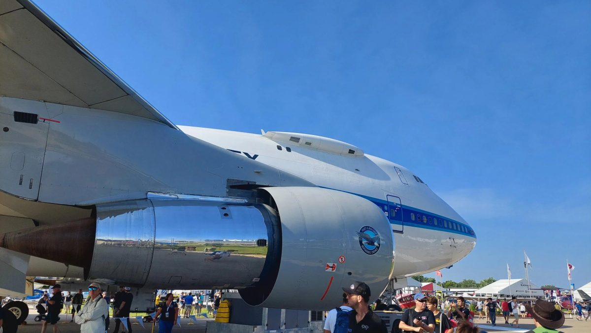 Isaac Pischer / Advance-Titan -- Pratt & Whitney's rare 747SP test bed serves as a focal point to those entering Boeing Plaza during the 72nd annual EAA AirVenture Oshkosh.
