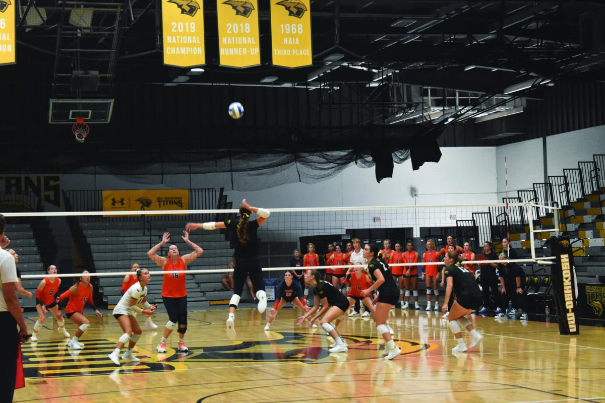 
Zach Bellin / Advance-Titan
UWO’s Sami Perlberg (5) attempts a kill in the match against Hope College on Saturday. Perlberg reached 1,000 kills in her three year career during the game against Hope.
