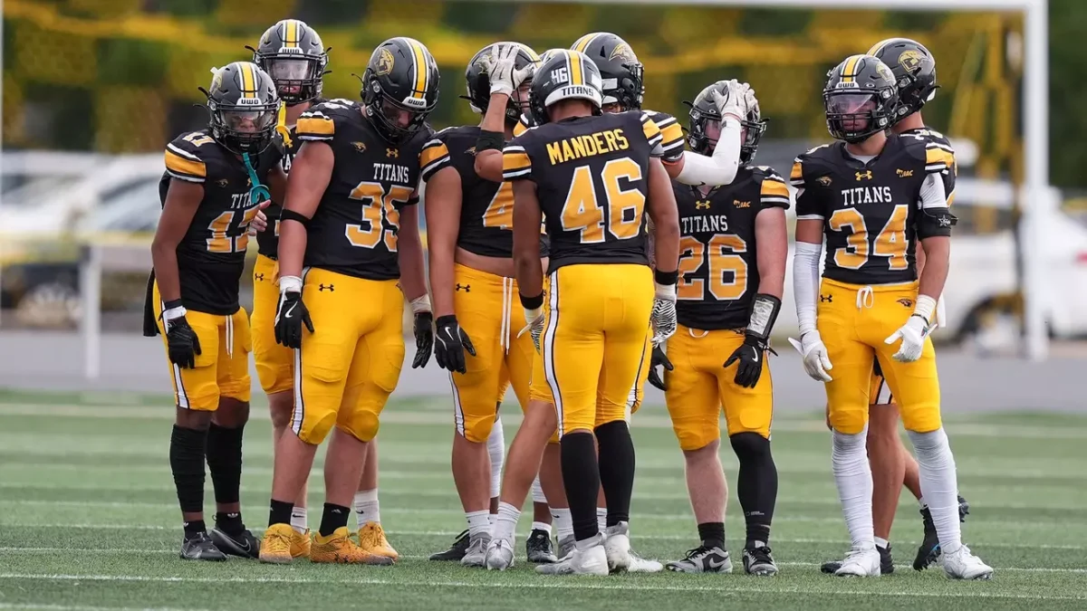 Courtesy of Terri Cole / UWO Athletics
The Titans huddle during a game last season. UWO opens up its home slate for 2025 on Saturday.