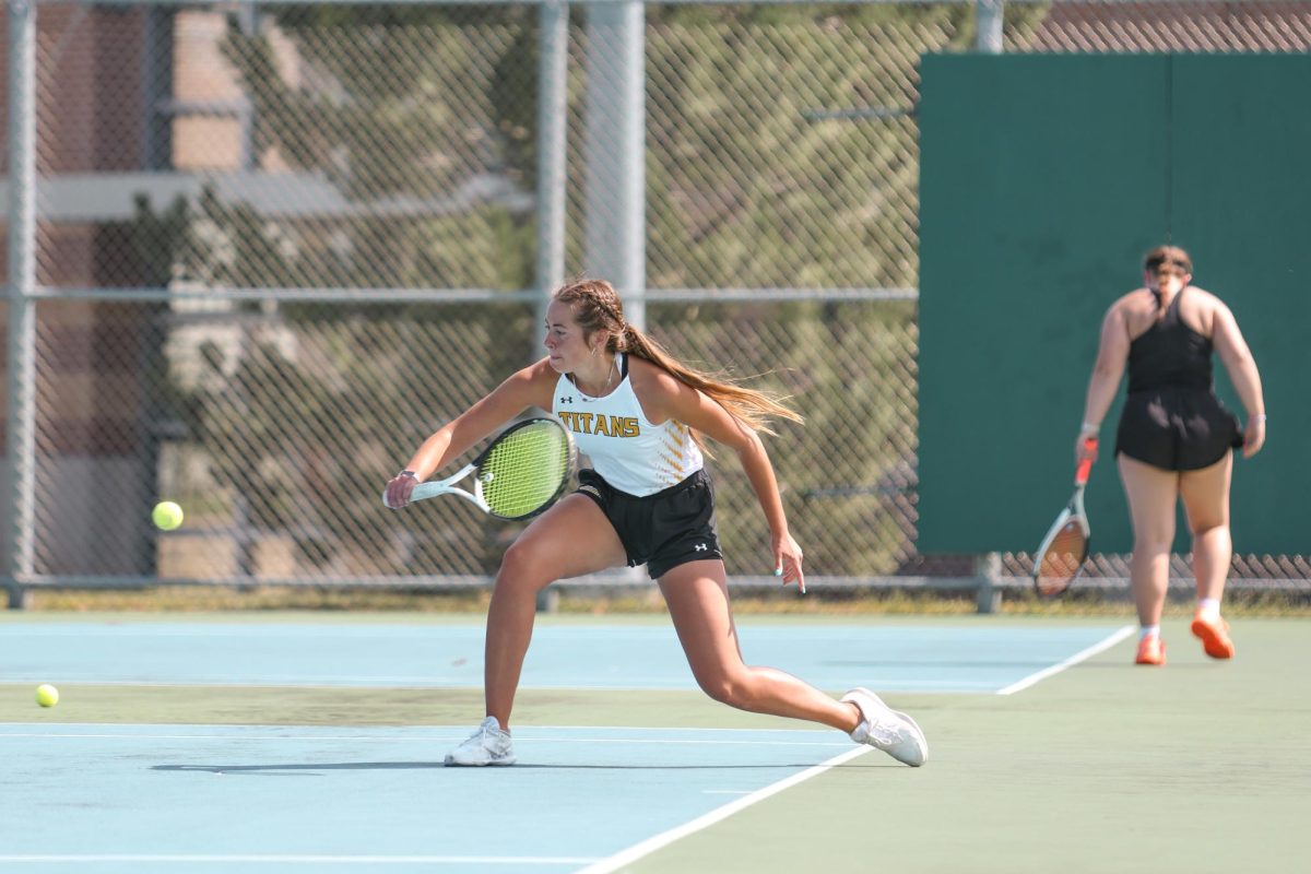 Morgan Feltz / Advance-Titan – The UWO tennis team competes at the Kolf Sports Center Outdoor Tennis Courts during a dual meet last season.