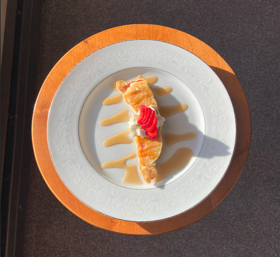 Cassidy Johnson / Advance-Titan – Bacon pancakes topped with syrup.