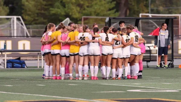 Courtesy of UWO Athletics – The UW Oshkosh women’s soccer team huddles up before its match against Gustavus Adolphus College (Minnesota) on Saturday
