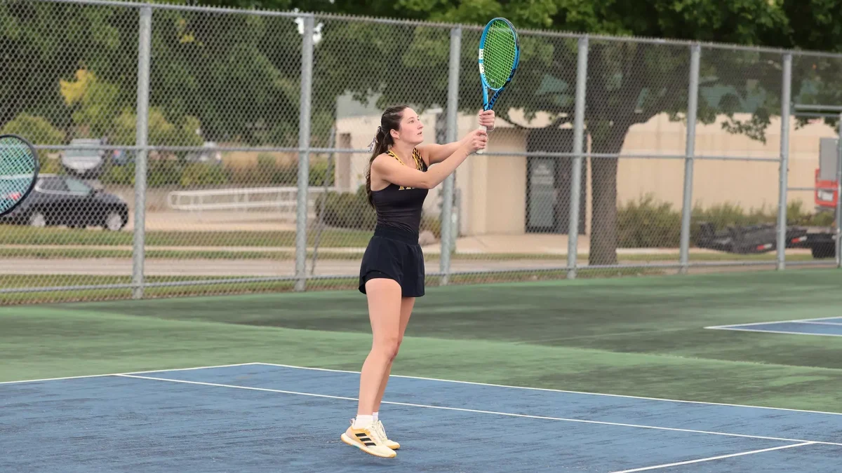 Courtesy of Steve Frommell / UWO Athletics – Courtney Carpenter returns the ball to help her and Olivia Pethan (not pictured) pick up a 7-5 victory in the No. 1 doubles match.  