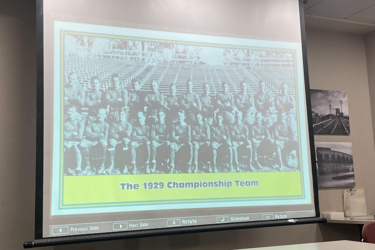 Zach Bellin / Advance-Titan -- The Oshkosh Public Library displays slides from the program Green Bay’s championship seasons on Sunday, Oct. 5.