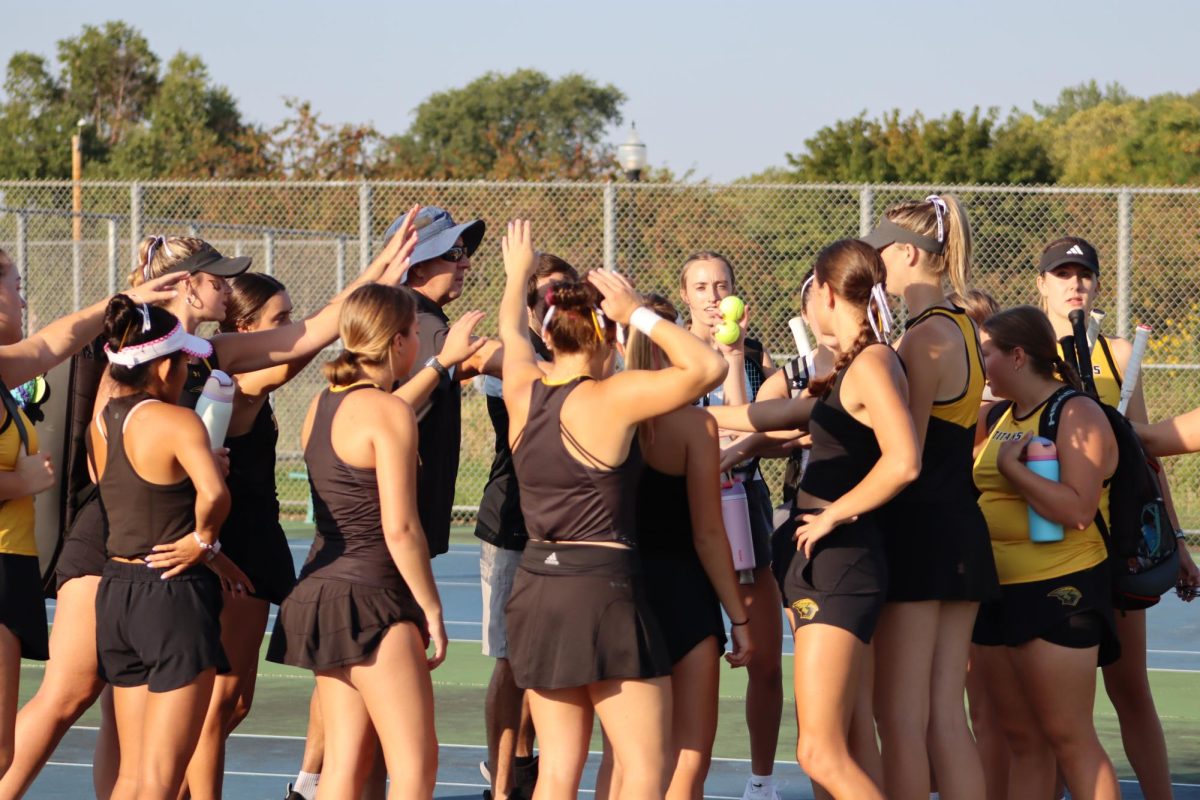 Katie Lechton / Advance-Titan
The UW Oshkosh women’s tennis breaks down its huddle ahead of its meet against UW-Eau Claire on Saturday at the Kolf Sports Center. 