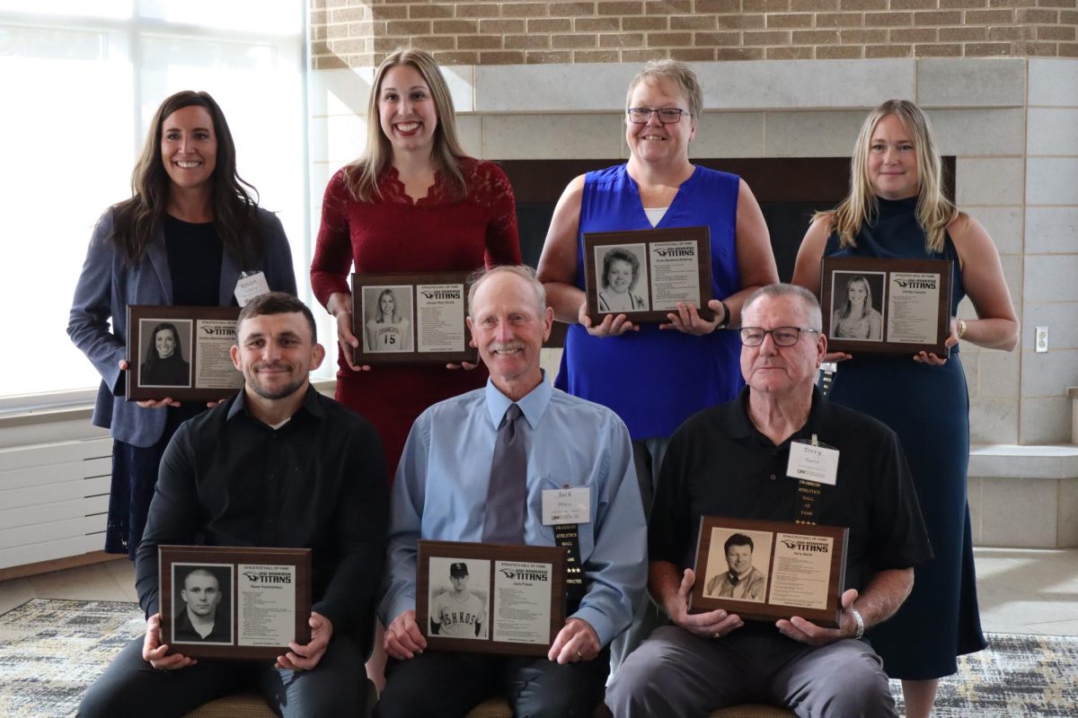 Katie Lechton / Advance-Titan 
The class of 2025 for the UWO hall of fame poses for a group picture during a ceremony on Sunday (Oct, 5.). The class featured seven former UWO athletes. 