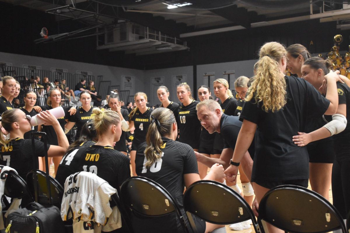 Nolan Andler / Advance-Titan – Head coach Jon Ellmann draws up a play against UW-Stevens Point earlier this season at the Kolf Sports Center on Sept. 26. The Titans beat the Pointers 3-0. 