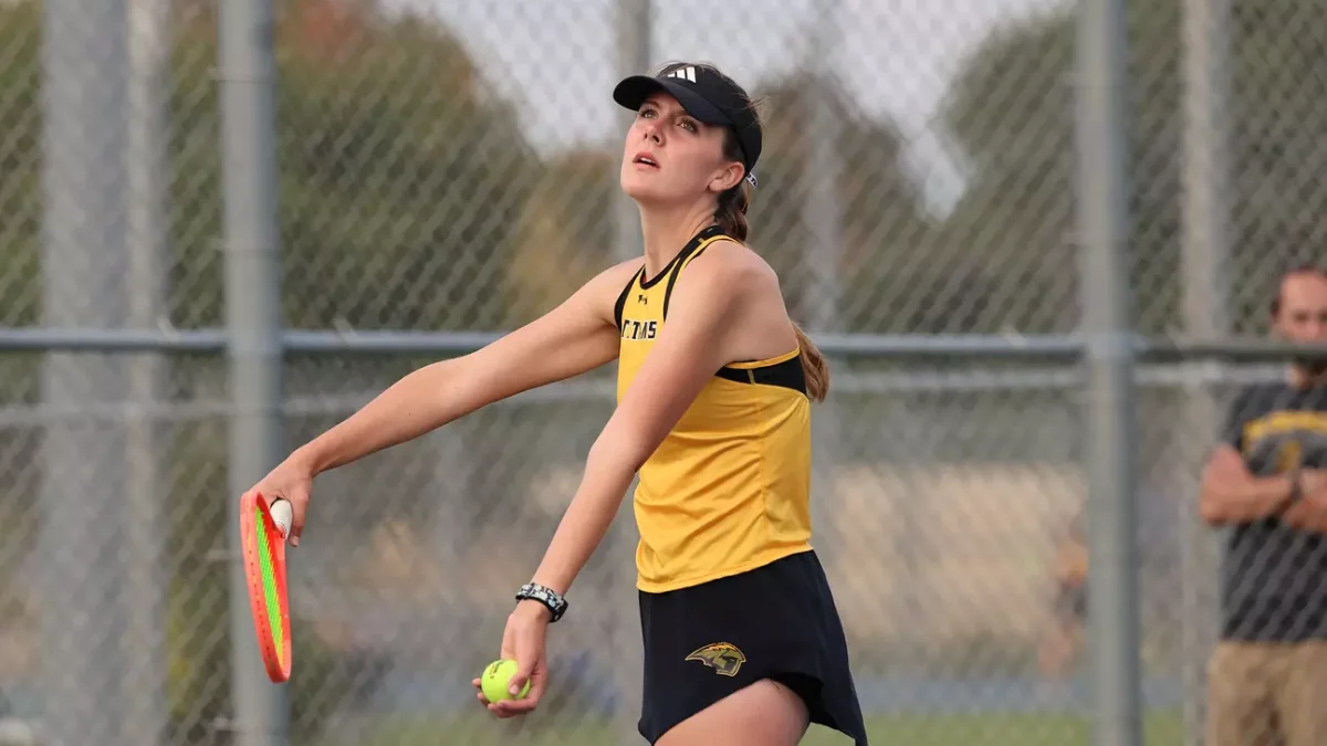 Courtesy of Steve Frommell / UWO Athletics – Bre Schultz goes up for a serve in a past match. Schultz won the only match of the day against the Pointers for UWO in the 6-1 loss. 