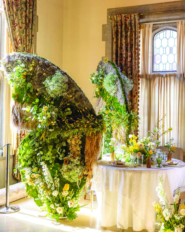 Courtesy of Sherry Luterbach -
A tablescape from 2024’s exhibition, featuring a set of butterfly wings in full bloom.
