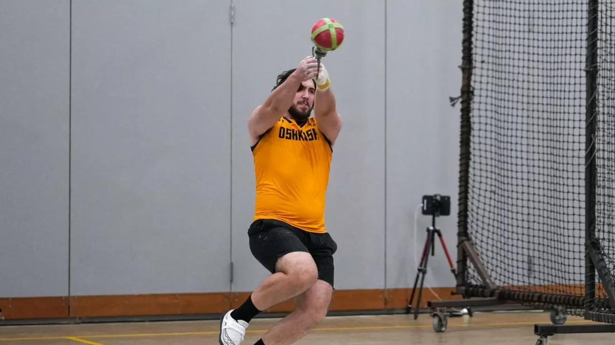 Courtesy of Terri Cole / UWO Athletics -- Gavin Fritsch participates in the weight throw in a indoor meet earlier this year at the Kolf Sports Center.