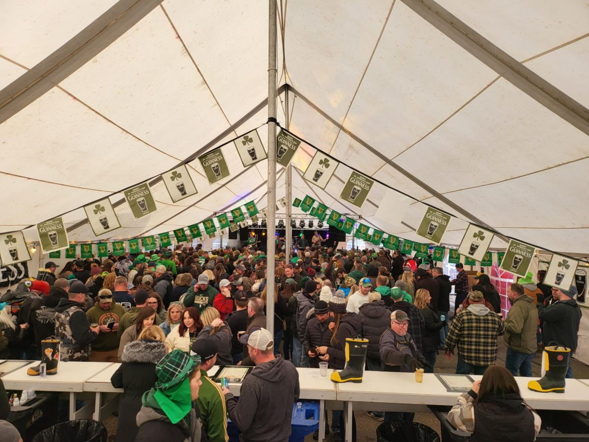 Courtesy of Mark Rutkowski - Dublin’s Pub’s well-known annual St. Patrick’s Day Tent Party, complete with live music, drinks and celebrity bartenders from the Oshkosh Fire Department.