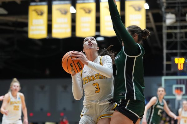 Courtesy of UWO Athletics -- 
UWO forward Sarah Hardwick puts up a shot over a Wisconsin Lutheran College defender at the Kolf Sports Center March 7.
