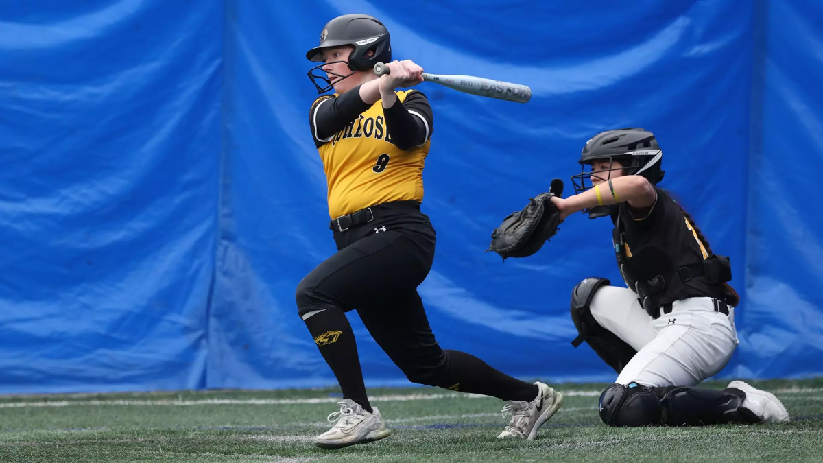 Courtesy of Steve Frommell / UWO Athletics -- 
Freshman Emma Bohn takes a swing against UW-Superior on March 1. 

