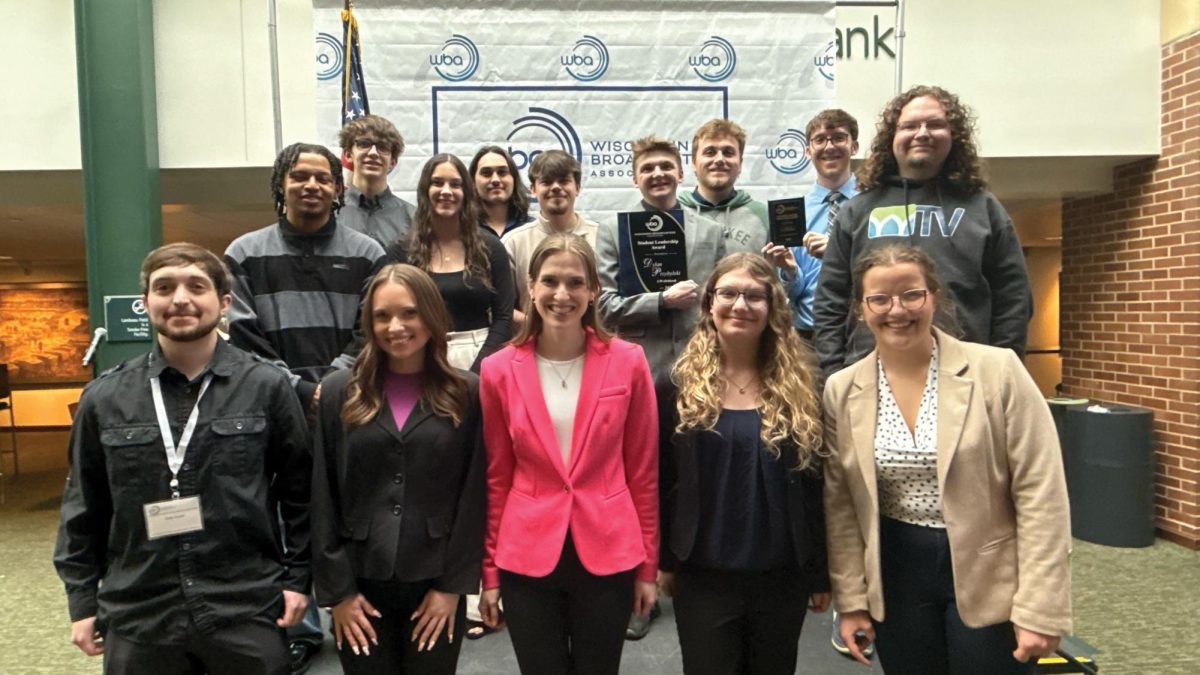Courtesy of Justine Stokes ---
Titan TV students pose for a photo after being awarded at the Wisconsin Broadcasters Association Student Forum at Lambeau Field on Feb. 28. Titan TV received a total of four awards.