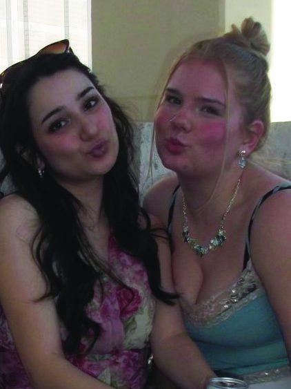 Vladyslav Plyaka / Advance-Titan - Arts & Culture Editor Cassidy Johnson and Opinion Editor Suzanne Dawood pose together.
