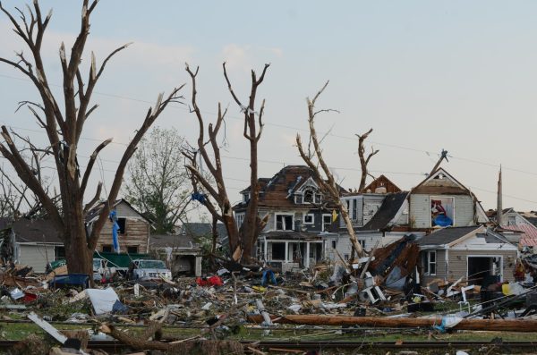 Vladyslav Plyaka / Advance-Titan --- Destroyed houses and cars, downed trees and power lines after a tornado touched down in Menasha on Monday, July 27, filling 3rd St. with debris.